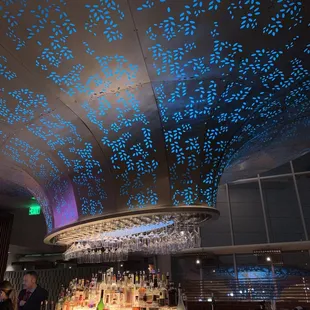 a bar with a lot of bottles on it