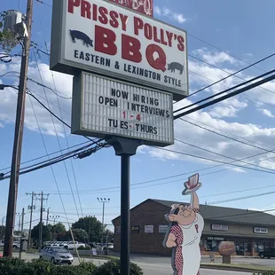 ows a sign for the restaurant