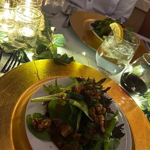 Spring mix salad with candied walnuts, dried cranberries, English cucumber and raspberry balsamic vinaigrette