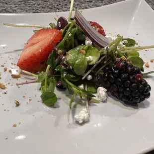 Microgreen Salad with seasonal berries, red onion, vinaigrette, pistachio, goat cheese