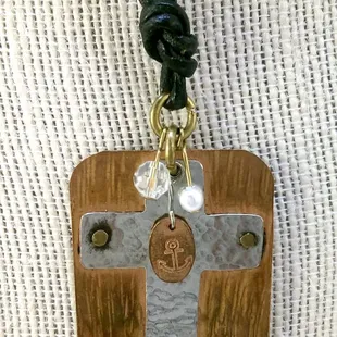 We have lots of one of a kind pieces by MollyMoo Creations, like this Navy anchor &amp; cross necklace.