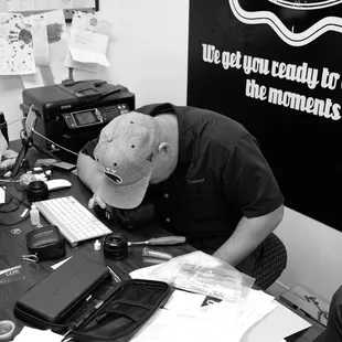 Tony hard at work cleaning that camera sensor.  If you need your camera sensor cleaned this is the guy to see