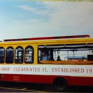 a yellow and red trolley