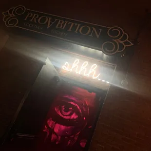 a neon sign for a bar