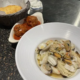 Mediterranean pasta with side of meatballs