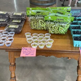Organic grapes and blueberries with samples to try