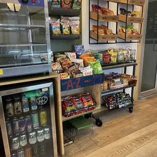 Chips, dips, sandwiches, fruit, candy, cold brew, soda, sparkling water, and energy drinks.