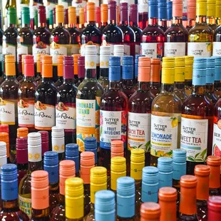 a large collection of wine bottles