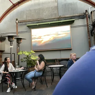 a group of people sitting around a table