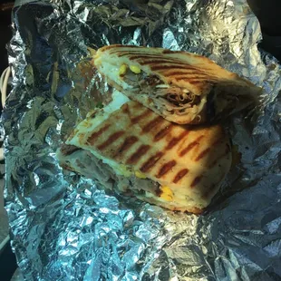 The steak grilled onions provolone cheese with a fried egg