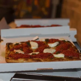 two pizzas in a box