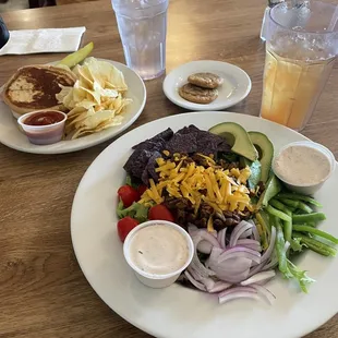 Top meal: The Regulator and chips Bottom meal: Mushroom Taco Salad