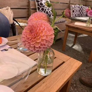 a vase of flowers on a table