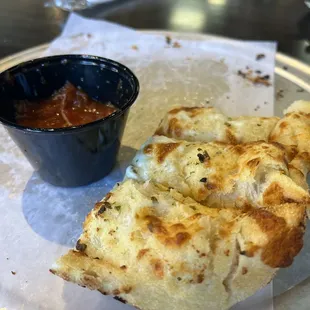 Cheesy Garlic Bread w/ a side of marinara ($8). The marinara sauce is the real deal w/ chunks of fresh tomatoes