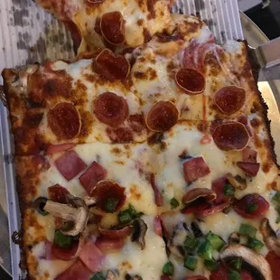 Large Supreme Pizza at Prohibition Pizza, Lake Orion.  &quot;Supremely&quot; missing toppings.