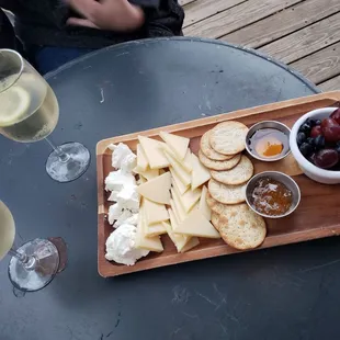 Cheese plate. Lavender French 75. Outdoor seating.