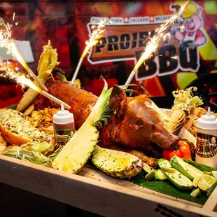 a platter of food with sparklers