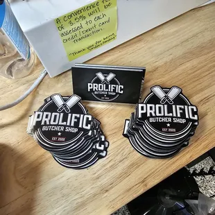 two stickers on a counter