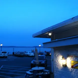 a view of the parking lot at dusk
