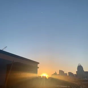 the sun setting in the background