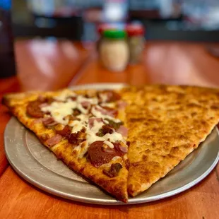 two slices of pizza on a plate