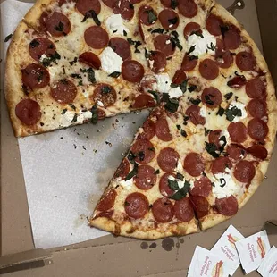 Large Pepperoni pizza with ricotta and basil. Very good