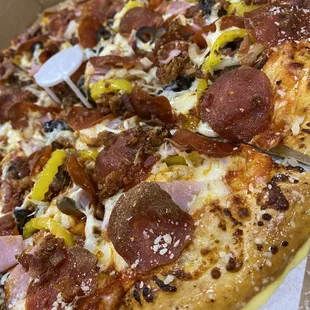 pepperoni, olives, and cheese