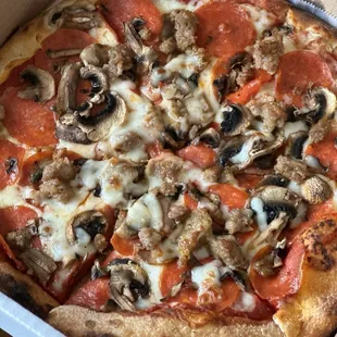 10" Mozzarella Cheese Pizza with sausage, pepperoni and shrooms.