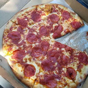 Jersey "upside down" style, cheese first, then pepperoni, sauce on top!  Thin &amp; crispy!!