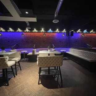 a room with a bar and a couch