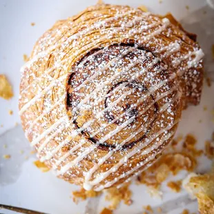 A Morning Bun is a cinnamon roll made on croissant dough. It is light, flaky, and delicious.