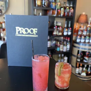 two cocktails on a bar counter