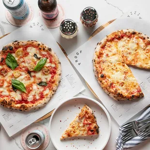 two slices of pizza and a plate of pizza