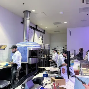 people working in a restaurant kitchen
