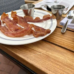 Perfectly cooked bacon. Hot syrup. Details.