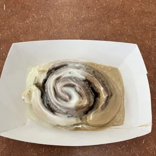 Sourdough cinnamon roll with regular and maple icing.