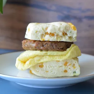 a sausage and egg biscuit sandwich