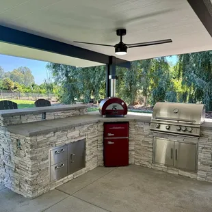 Our New Patio. We added an Italian pizza oven, Retro mini Fridge, and a large BBQ with lighting.