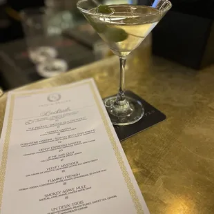 a martini on a table