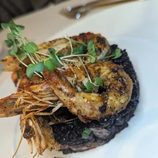 Shrimp with black rice and crab
