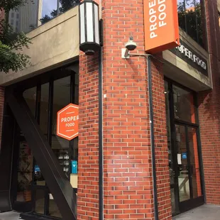 a corner of a brick building