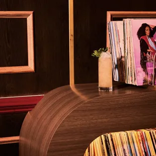 a picture of a record collection on a desk