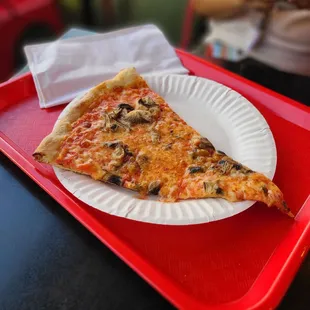 Slice of a Mushroom Cheese Pizza