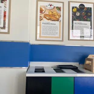 Dedicated photo on the wall, trash, &amp; another vendor!