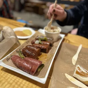 Sausage Sampler w/several choices of German mustards AND German potato salad