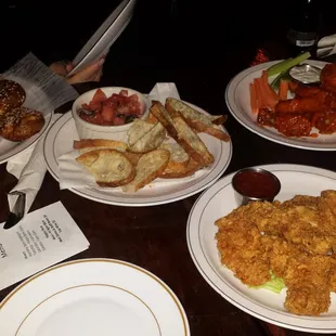 Wings, pretzels, chicken tenders and a tomato thing that i forgot the name of :)