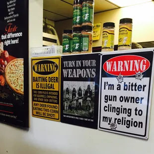 a variety of signs on a counter