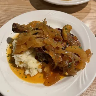 Bone in por chop apples onions and mashed potato&apos;s