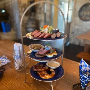 three tiered trays of food