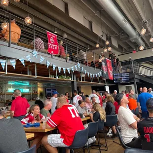 a large group of people sitting at tables